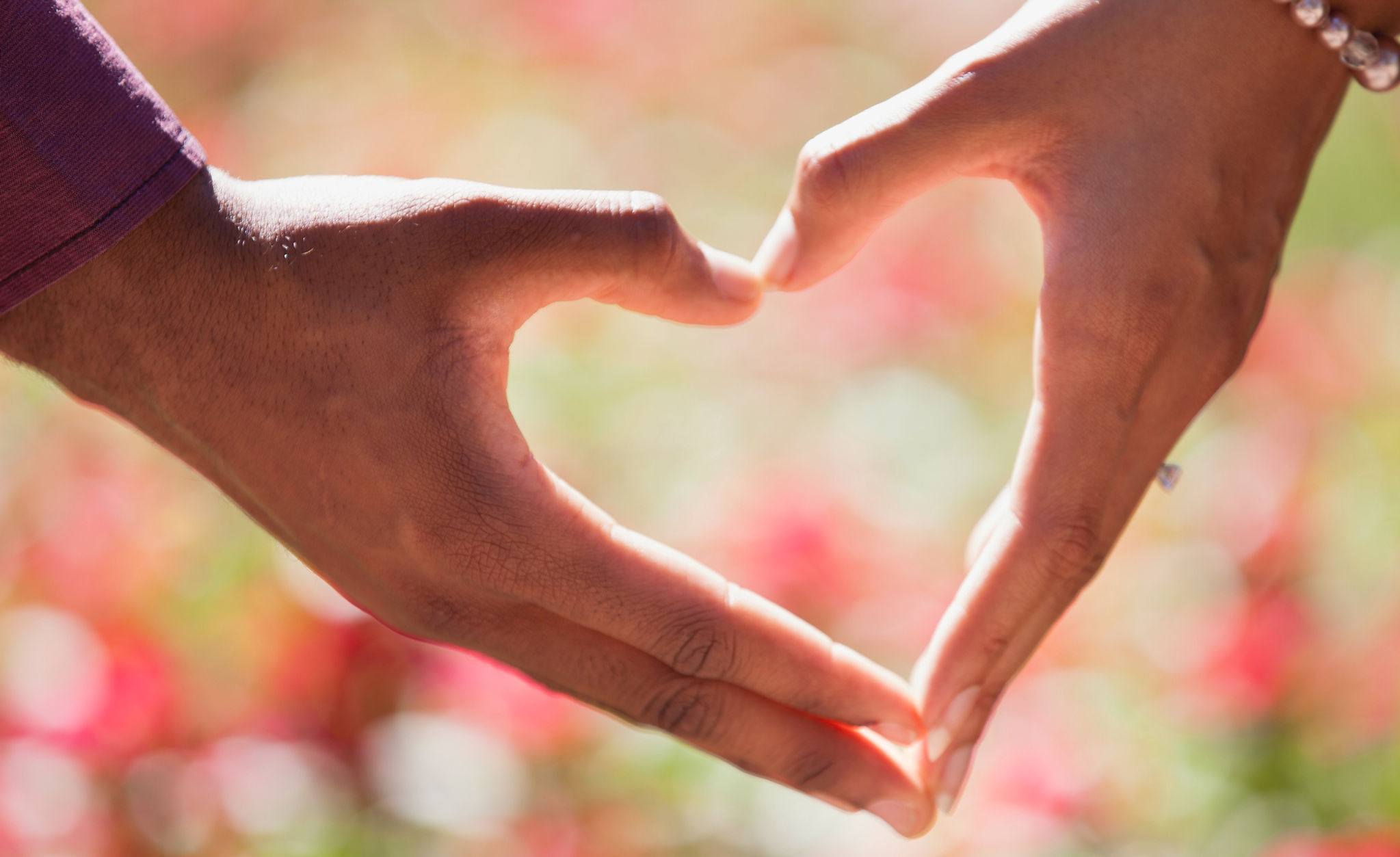 Two hands forming a heart