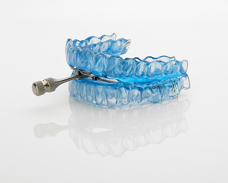 Ortho appliance for sleep apnea.